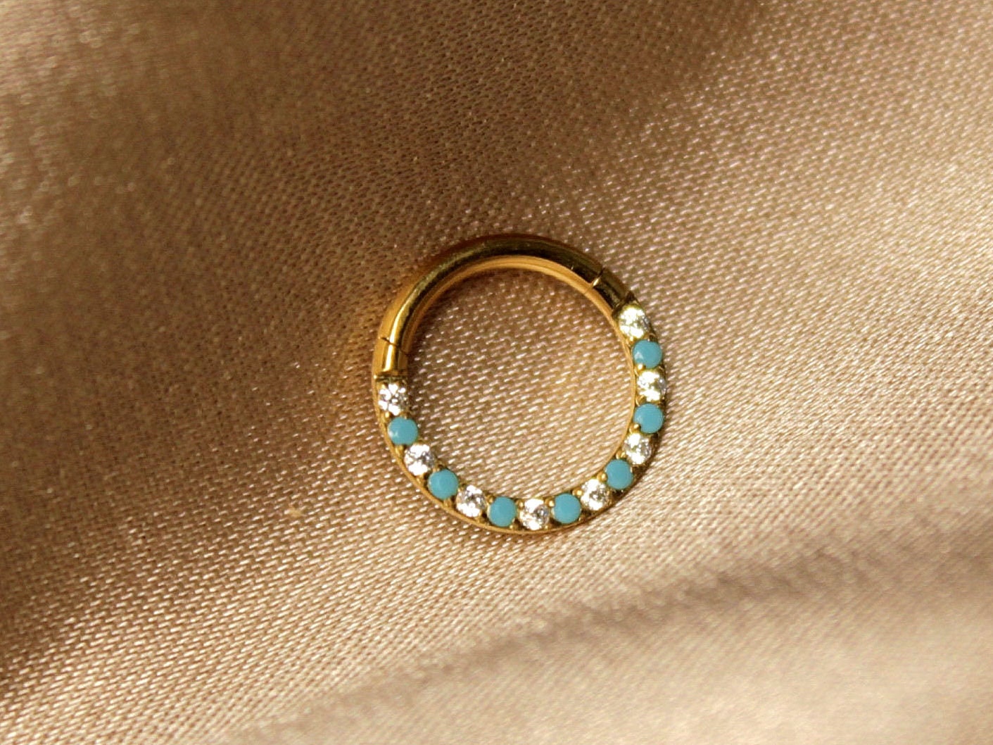 16G Gold Septum Clicker Hoop, Turquoise and Clear Gems Front Facing Septum Clicker Ring. Titanium Grade Segment Hinged Clicker Hoop Ring